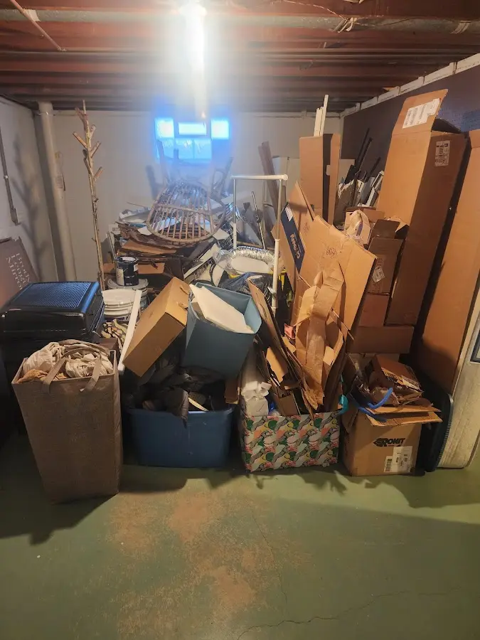 Roll-off dumpster container at job site for 15 Yard Dumpster Rental in Apopka